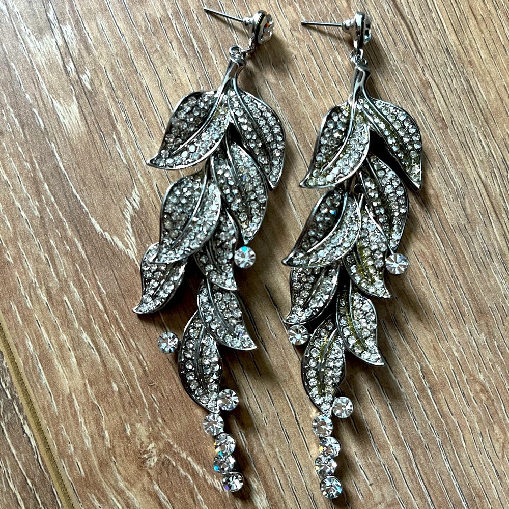 Sterling silver feather diamond earrings
